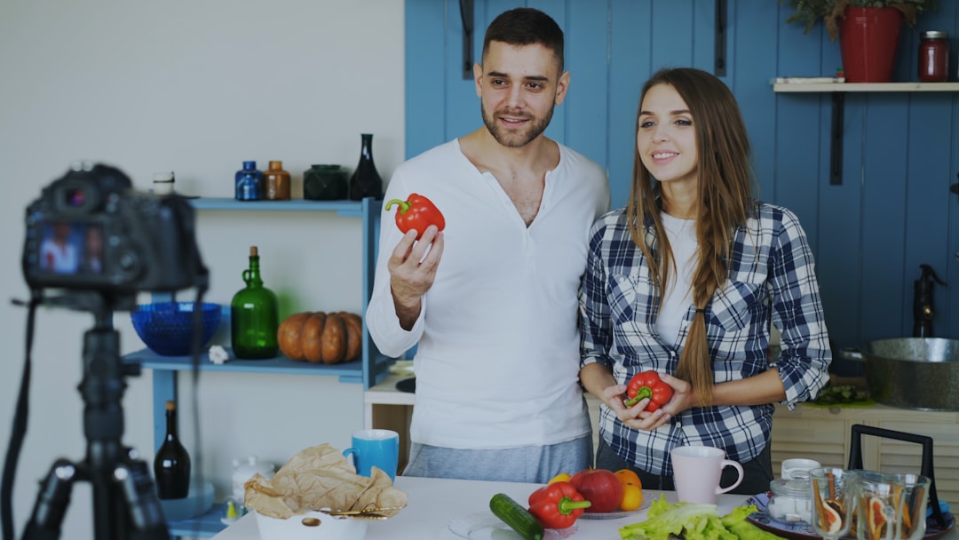 A collection of fresh, vibrant fruits, vegetables, nuts, and whole grains arranged on a kitchen counter, ready for cooking.